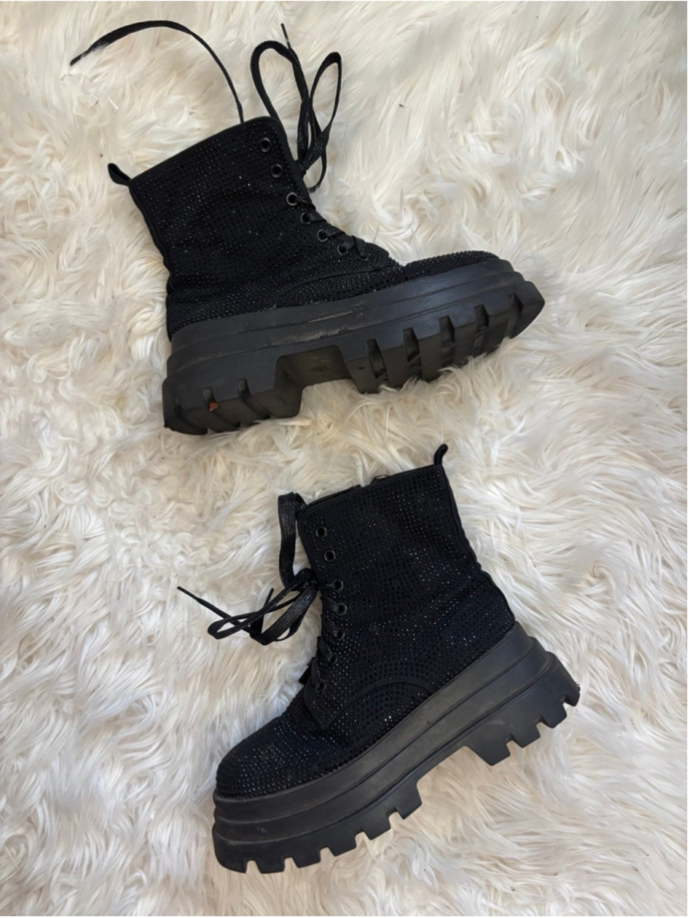 Well worn goth woman's rhinestone work platform combat boots